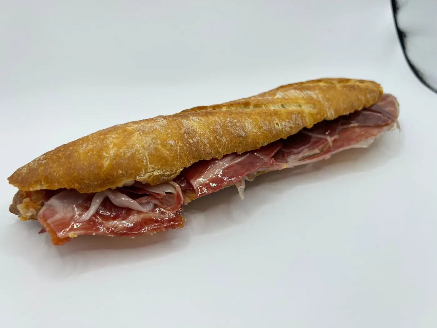 Entrepà de pernil en pa de vidre